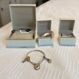 Silver Disney Pandora bracelet. 2 charms. Original Boxes included.